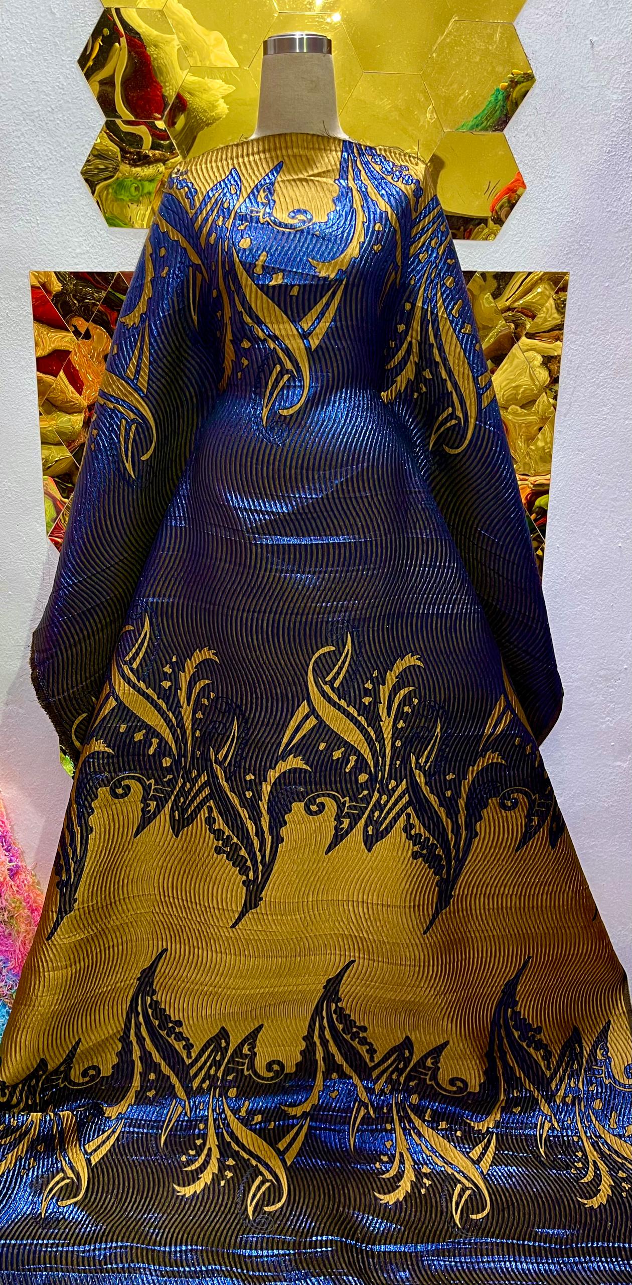 Royql blue and gold brocade.      Selling by yards