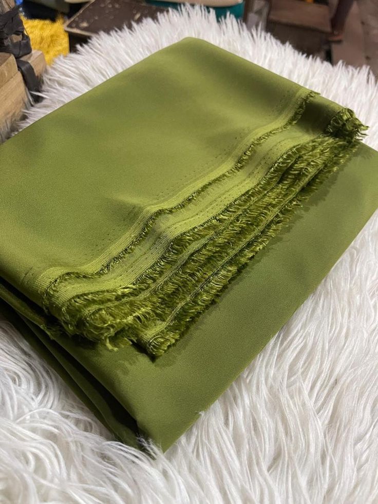 Olive green crepe fabric#1.   Selling by yards