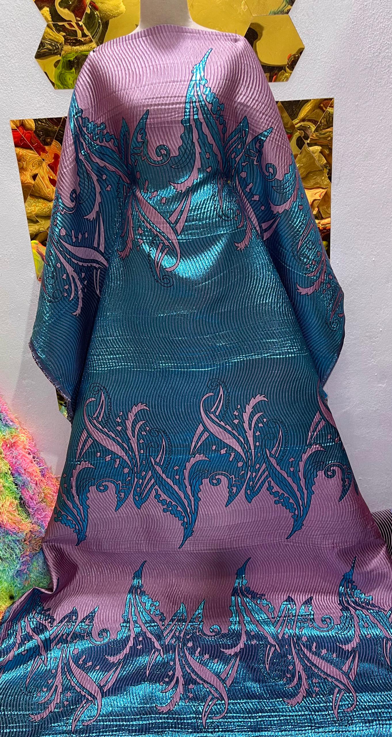 Lilac and tea  brocade.     Selling by yards